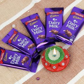 Sweets With Diya and Greeting Card