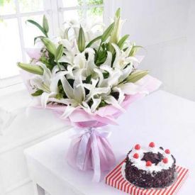 Lily Flowers with Black Forest Cake And Diya