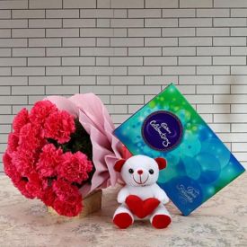 10 mixed Gerberas,Teddy Bear, Dairy milk