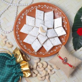 Cashews of 100 gm,Kaju Katli of 250 gm,1 Rakhi