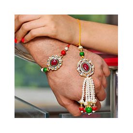 Lumba Rakhi which has maroon stone