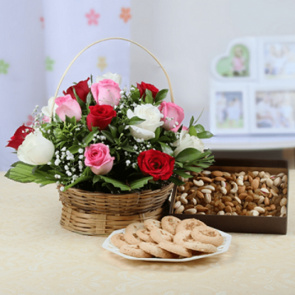 Basket of mix Roses with dry fruits and sweets