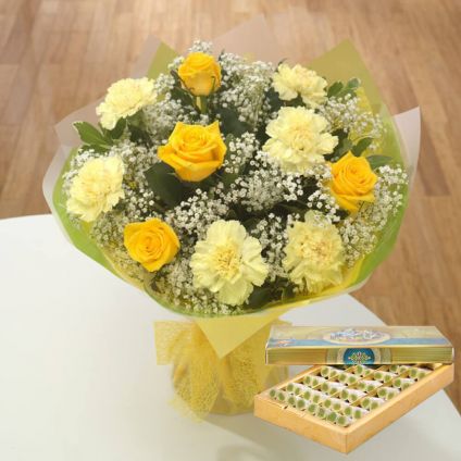 Yellow and White carnation and Mixed Sweets