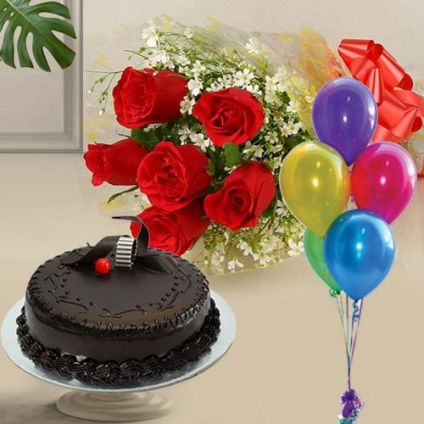 Mixed gerberas ,chocolate cake and ballooons