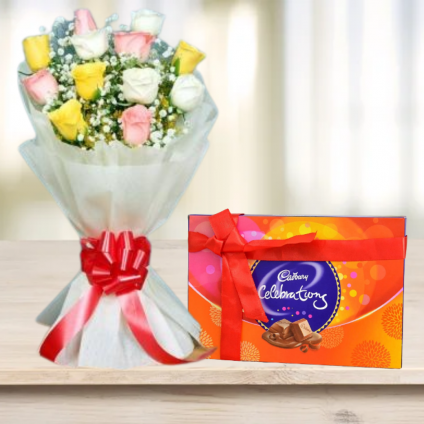 Red roses with cadbury celebration