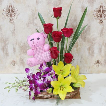 Mixed Flowers With teddy bear.