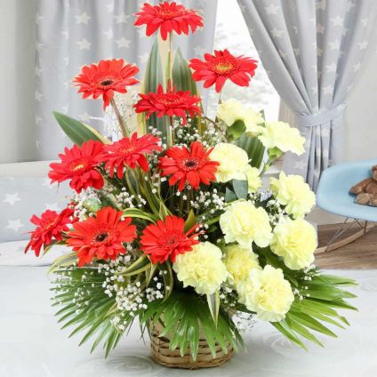 Arrangement of Gerber's & Red Carnations