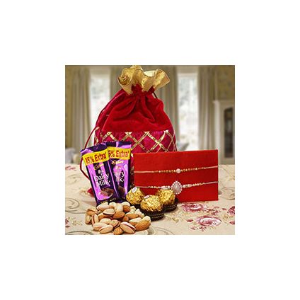 Chocolates to a Designer Potli Bag full of mixed dryfruits Dairy Milk chocolates