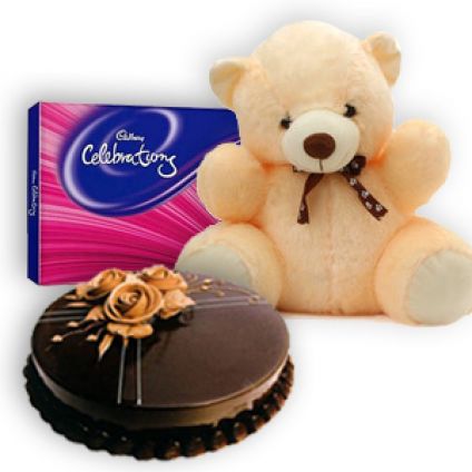 1kg chococlate cake , 12 inch teddy and cadbury celebrations.