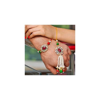 Lumba Rakhi which has maroon stone