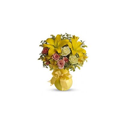 yellow assortment of lilies, roses, alstroemeria and assorted greens are presented in a lovely yello