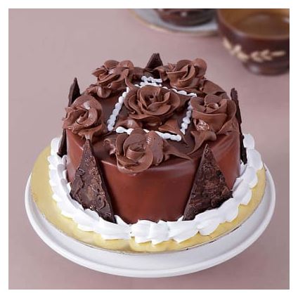 Half Kg Round Chocolate Cake with Chocolate Cream Flowers