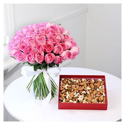 Pink roses with dry fruits