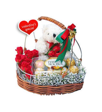 10 Red Roses, 6 inch teddy bear and 16 Pcs Ferrero Rochers with Basket